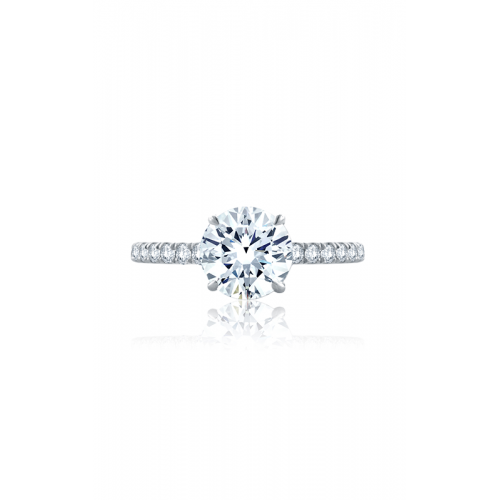 A sparkling solitaire diamond ring with a round-cut center stone on a white gold band, accented with smaller diamonds.