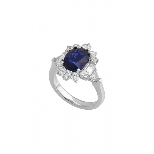 White gold ring with an oval blue sapphire set in the center, surrounded by sparkling white diamonds.