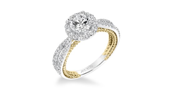 A white gold and yellow gold mixed metal ring with a halo setting, split bands, and side stones
