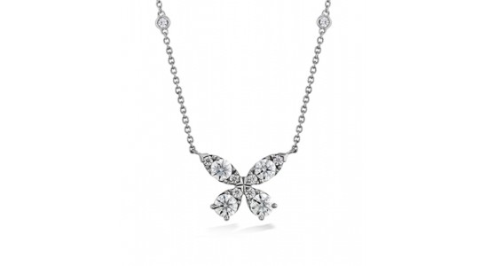 a white gold pendant necklace with a diamond butterfly pendant