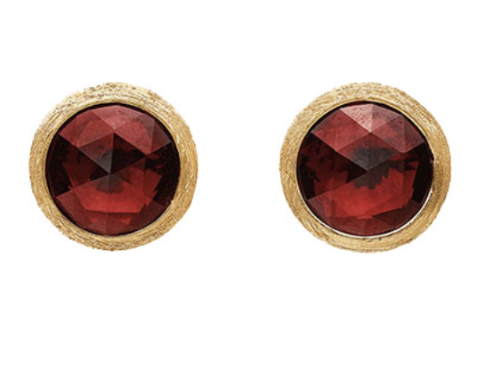 A yellow gold stud bezel set garnet earrings