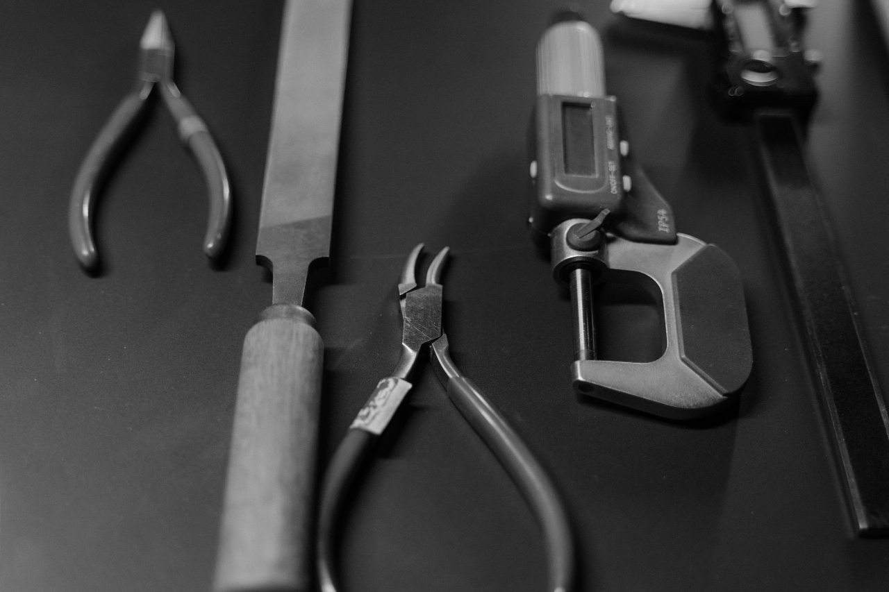 A close-up of a jeweler’s tools for repairing and maintaining fine jewelry.