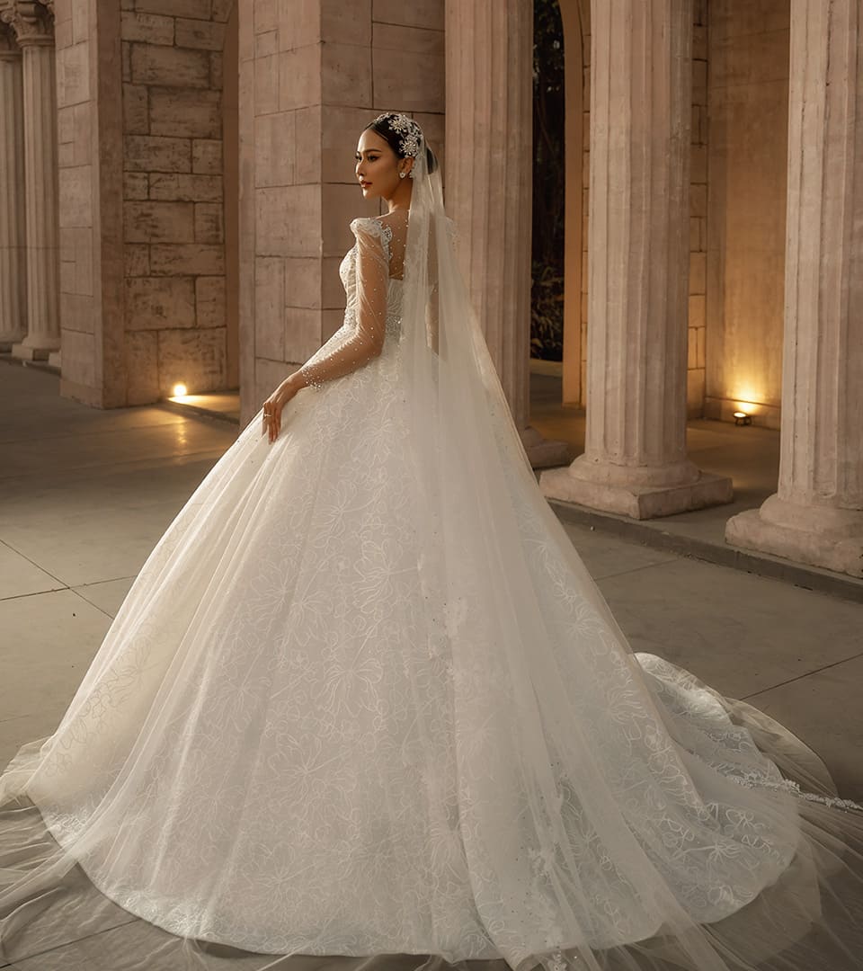Bride standing in a white wedding dress