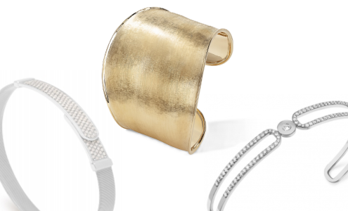 A close-up of three different styles of bangle bracelets, all available at Rogers Jewelry Co.